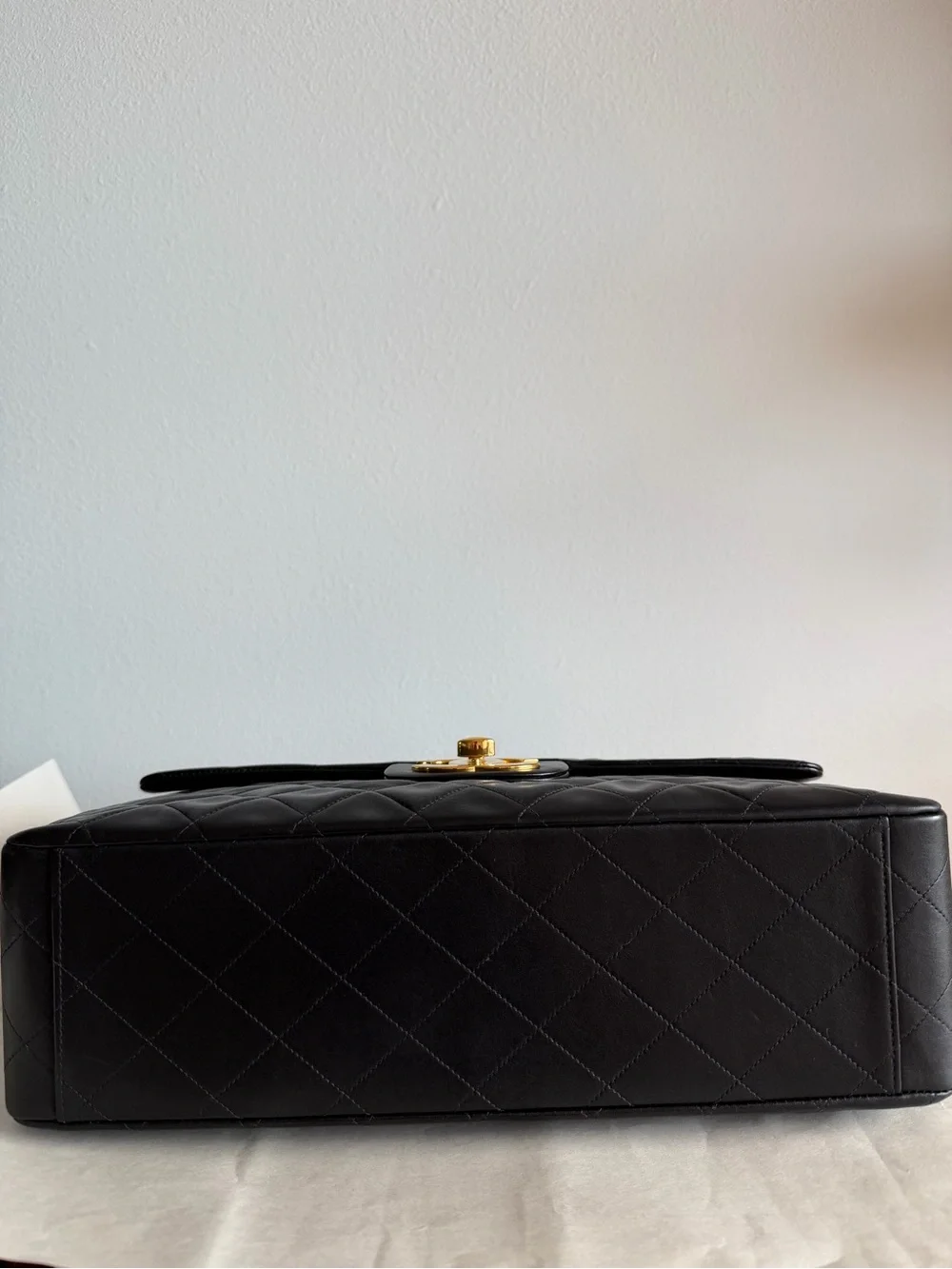 CHANEL Black Quilted Shoulder Bag with Gold Chain & CC Lock